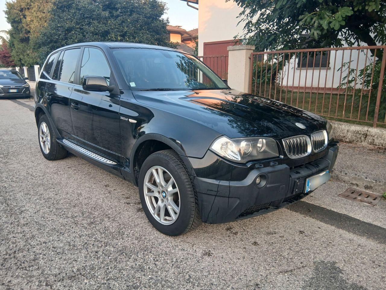 BMW X3 2006 — rear view