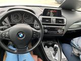 BMW 218d Cabrio in weiß mit Volllederausstattung - : V mit