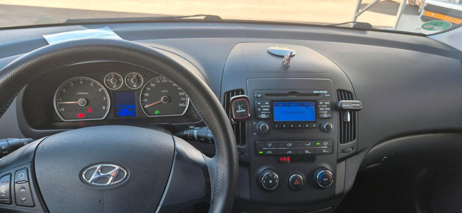 Hyundai i30 2011 — photo 8