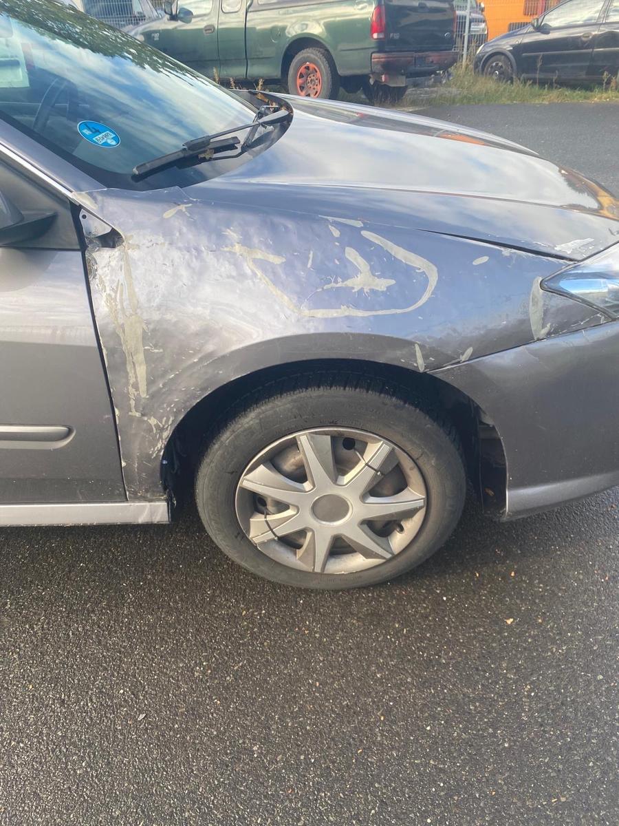 Renault Laguna 2012 — photo 12