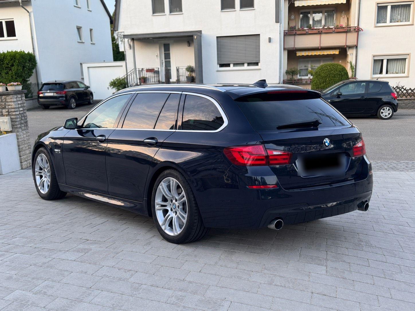 BMW 535 2011 — rear view