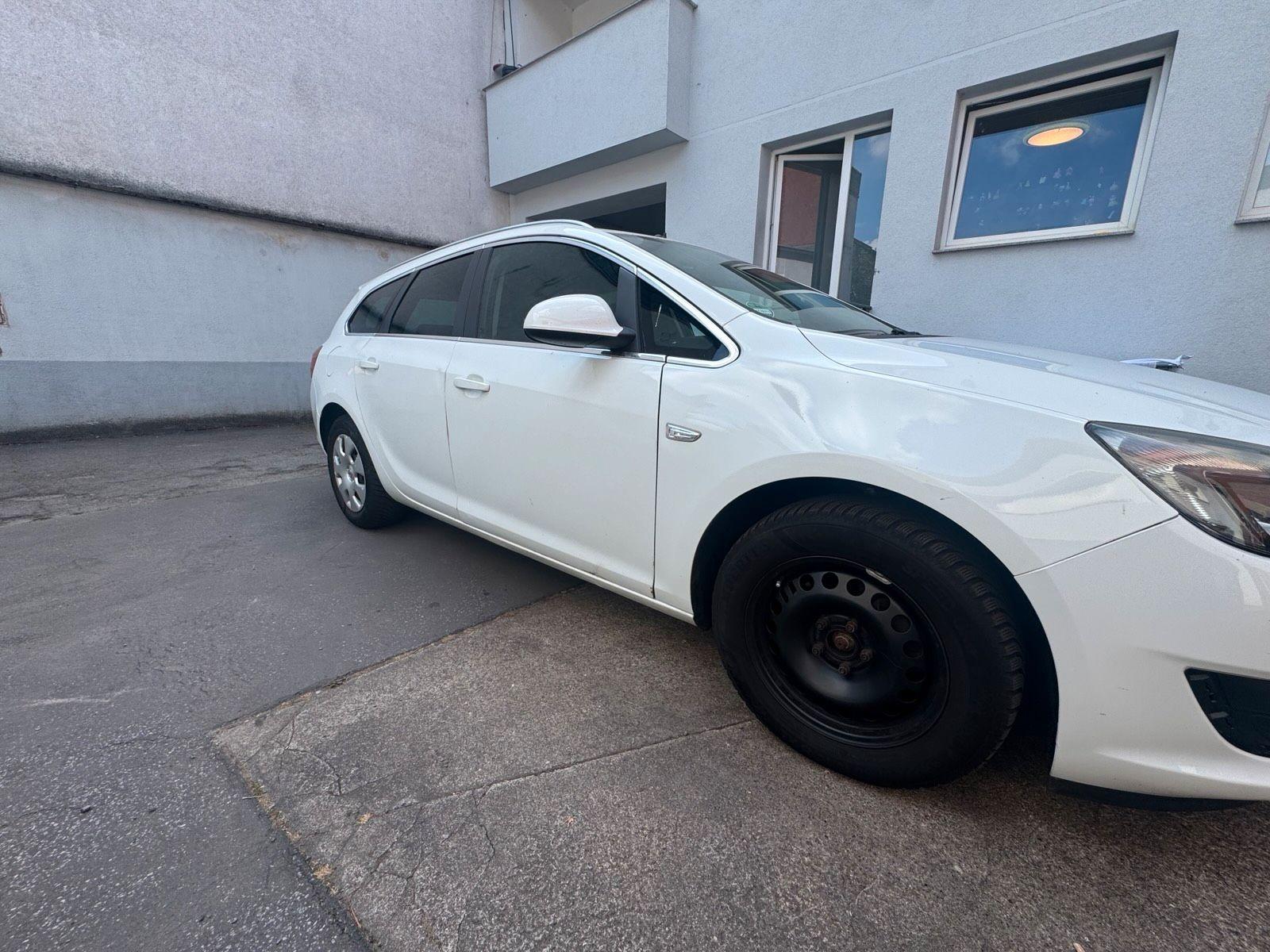 Opel Astra 2013 — engine 165 HP (121kW)