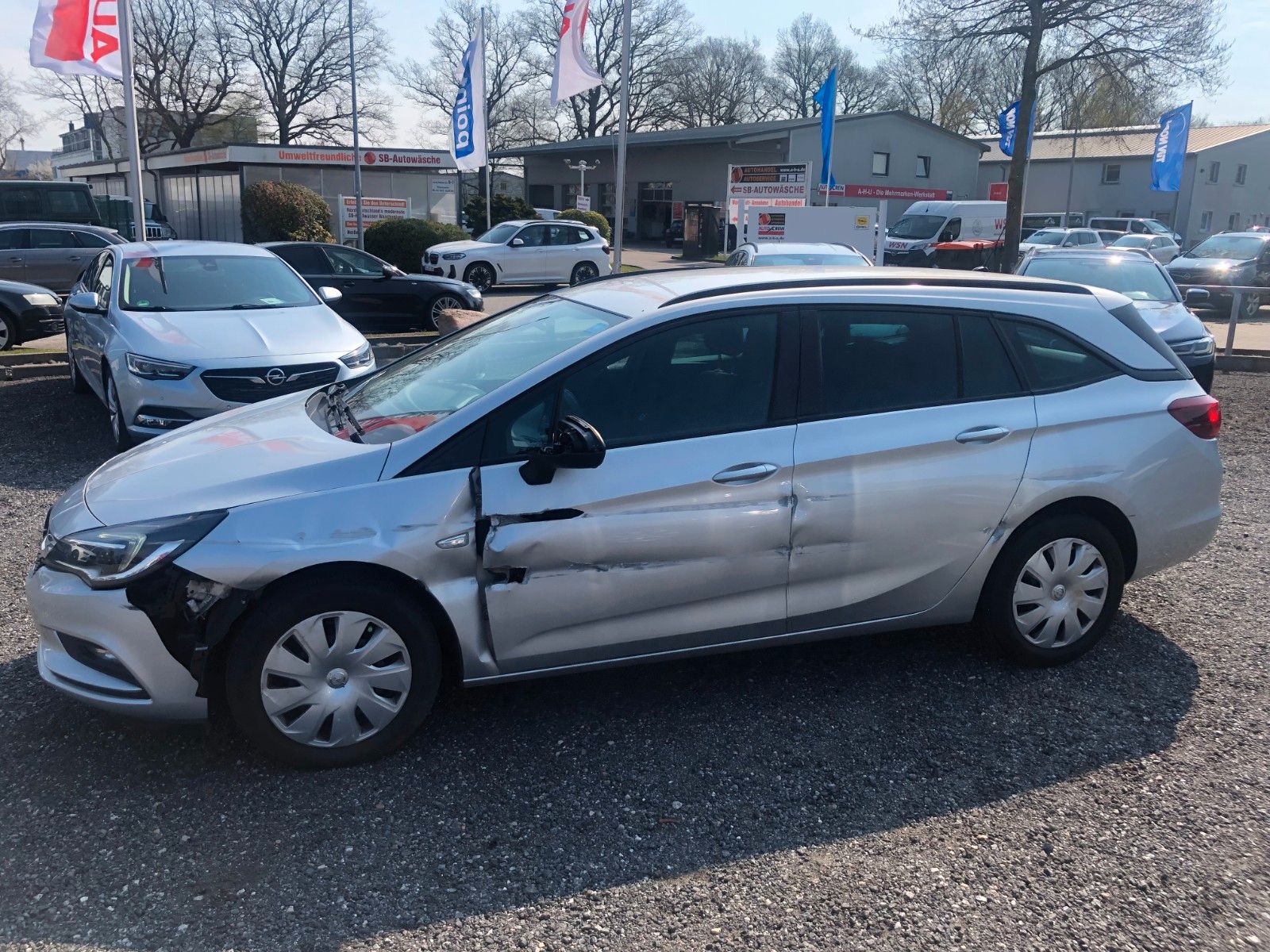 Fahrzeugabbildung Opel Astra K SportsTourer Business Unfall Fahrerseite