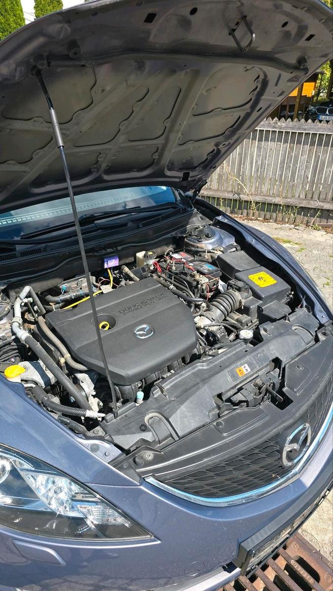 Mazda 2 2009 — photo 14