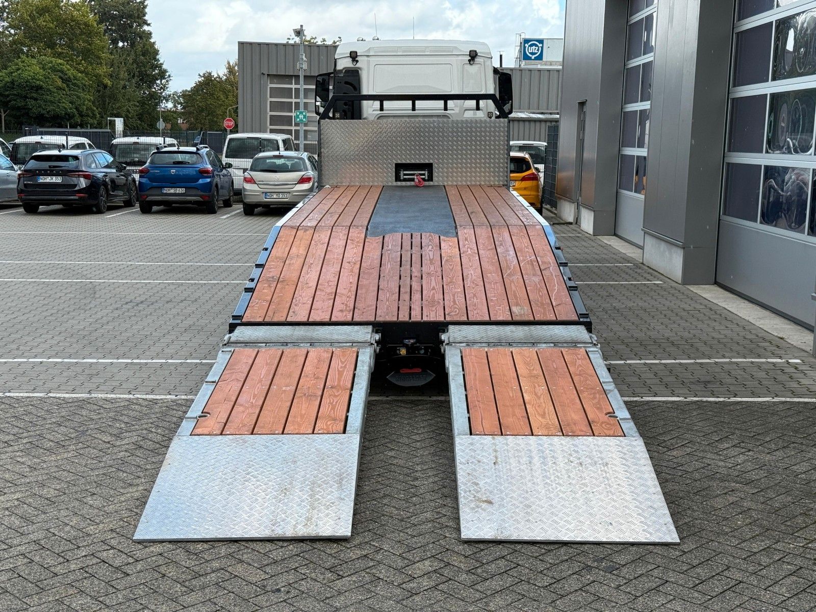 Fahrzeugabbildung MAN TGS 35.520 8x2H Maschinentransporter Funk* Seil*