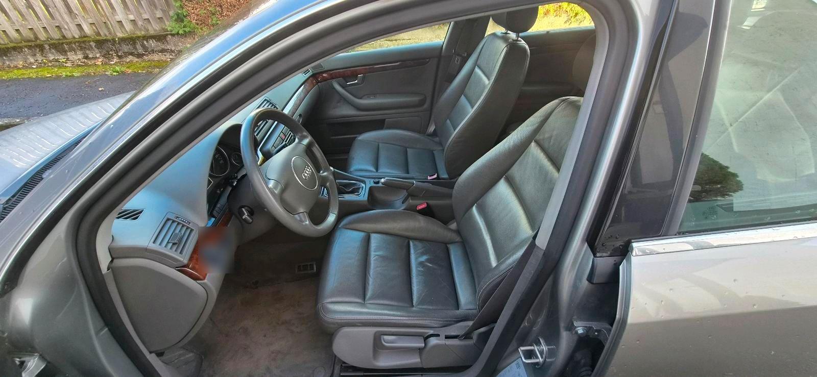Audi A4 2004 — photo 11