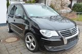 Volkswagen Touran 1.4 TSI Highline, 02/26 HU - Volkswagen Touran mit Benzin-Antrieb: Kleinbus, 2.0