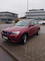 BMW X3 mit  venig km - BMW X3: Rot