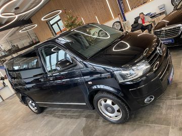 Volkswagen T5  Caravelle Comfortli *9-SITZER*NAVI*SZHZ*AHK*