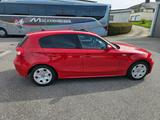BMW 120 i Rot mit winter und sommerreifen - gebrauchte BMW 120 aus dem Jahr 2004