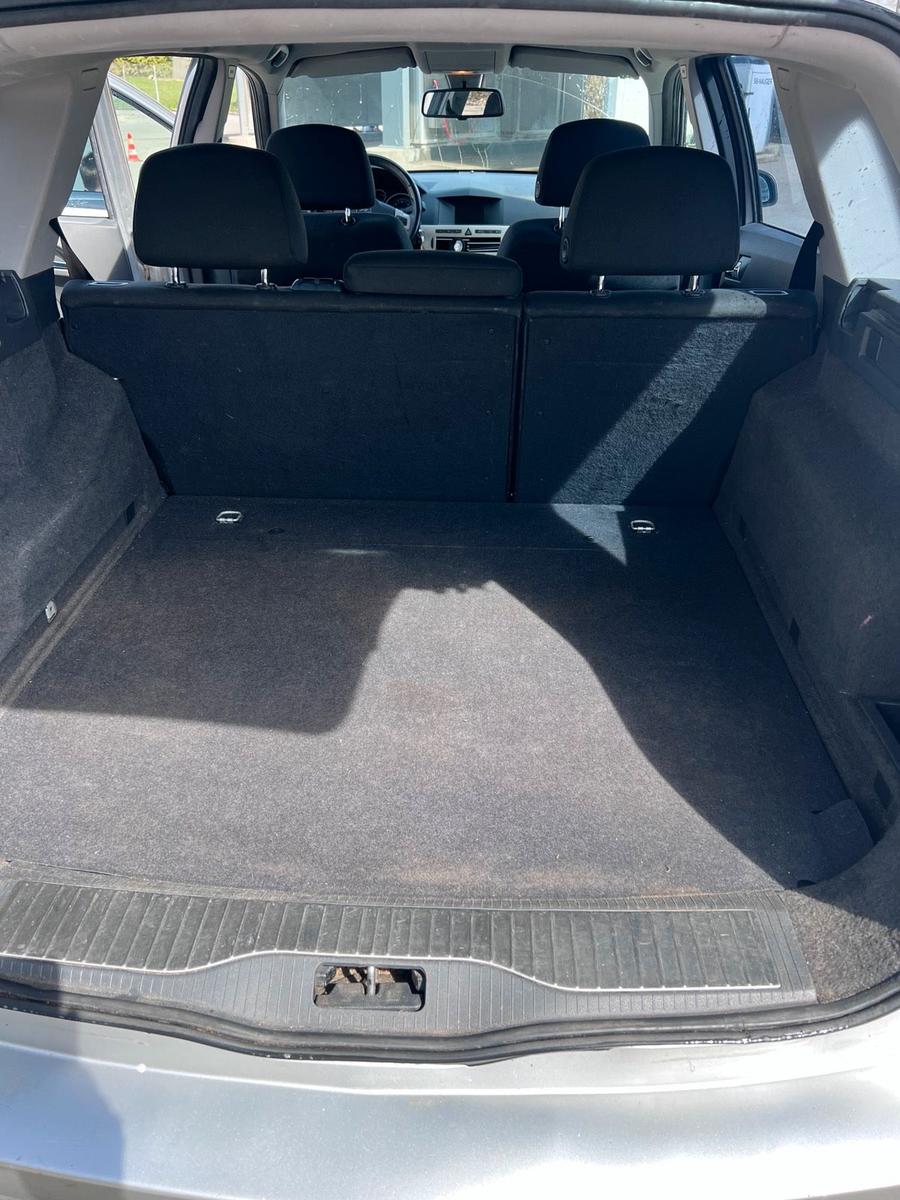 Opel Astra 2008 — photo 13