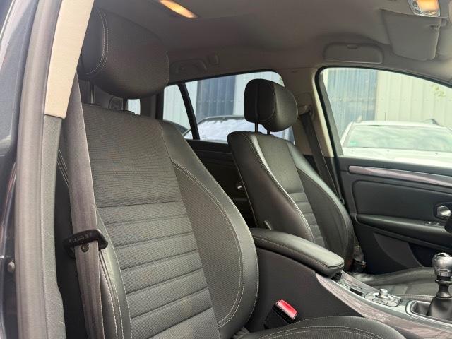 Renault Laguna 2010 — photo 28