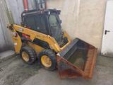 CAT 226D3 Lader mit Schwergutschaufel - CAT D3