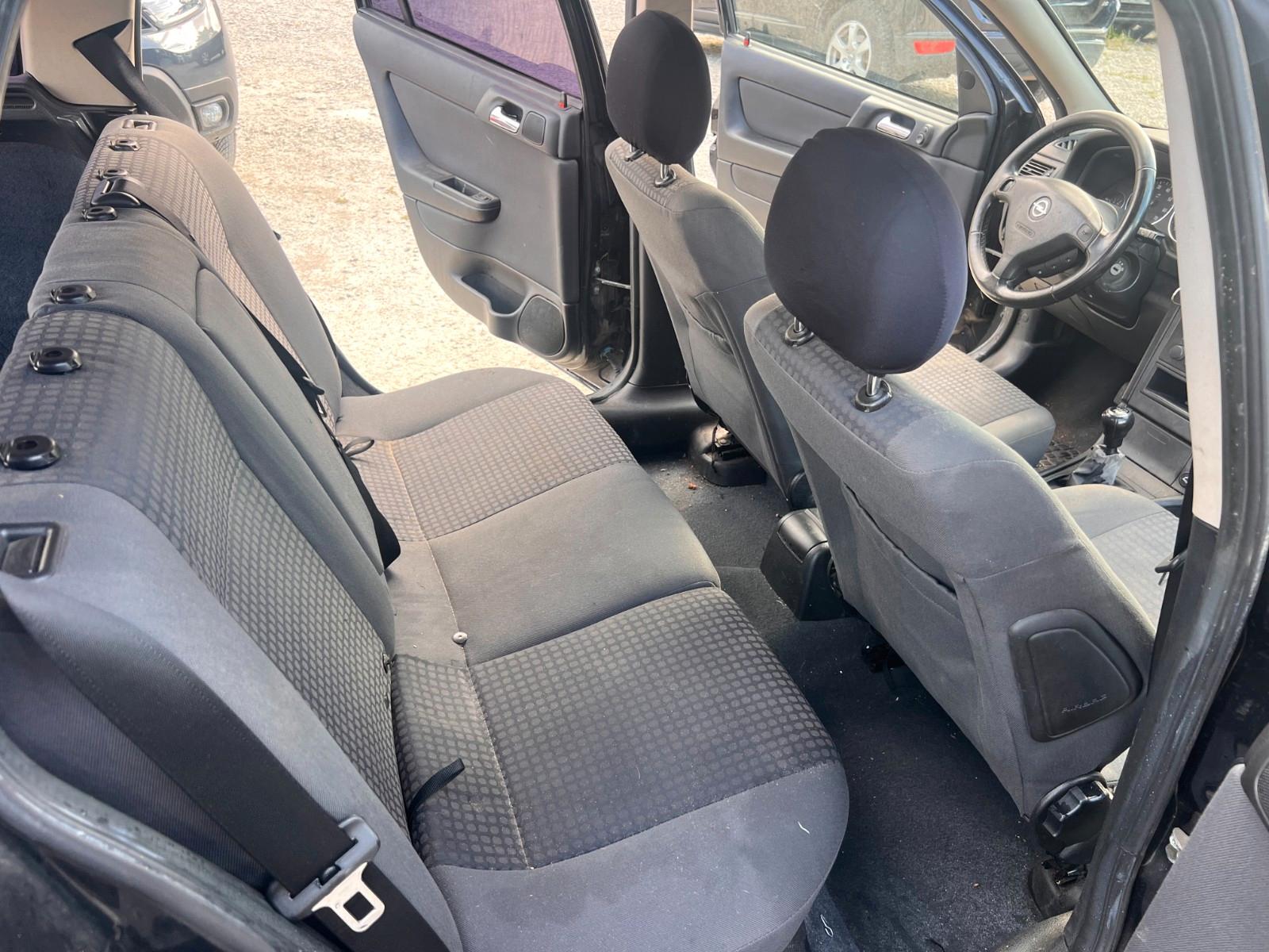 Opel Astra 2004 — photo 11
