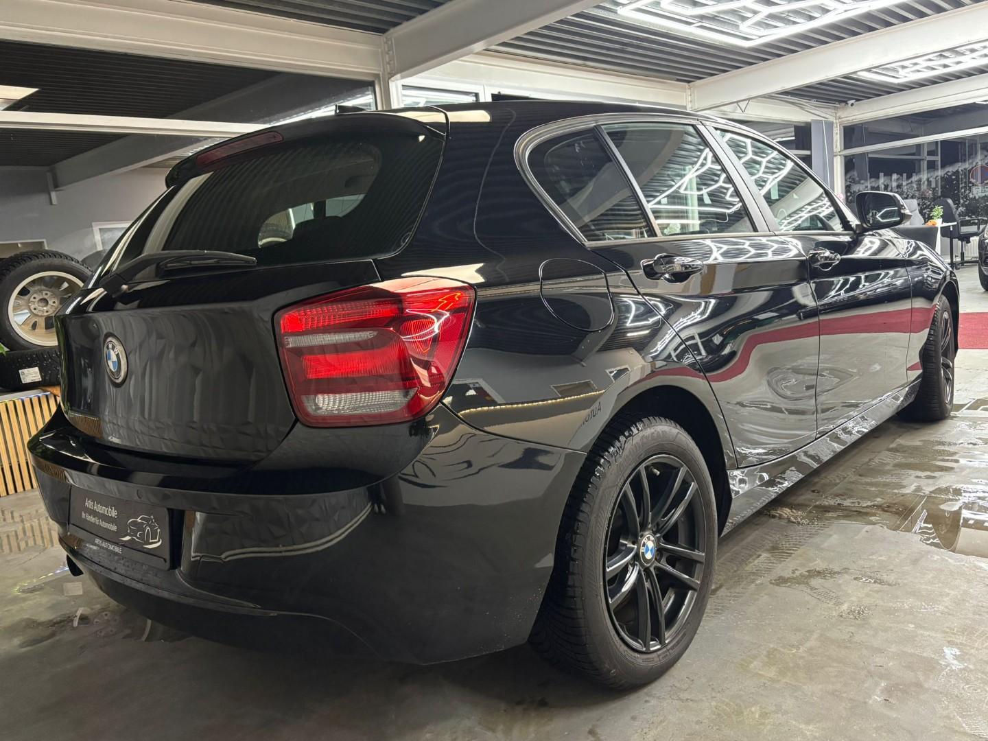 BMW 114 2014 — engine 1.598 cm³, 102 HP (75kW)