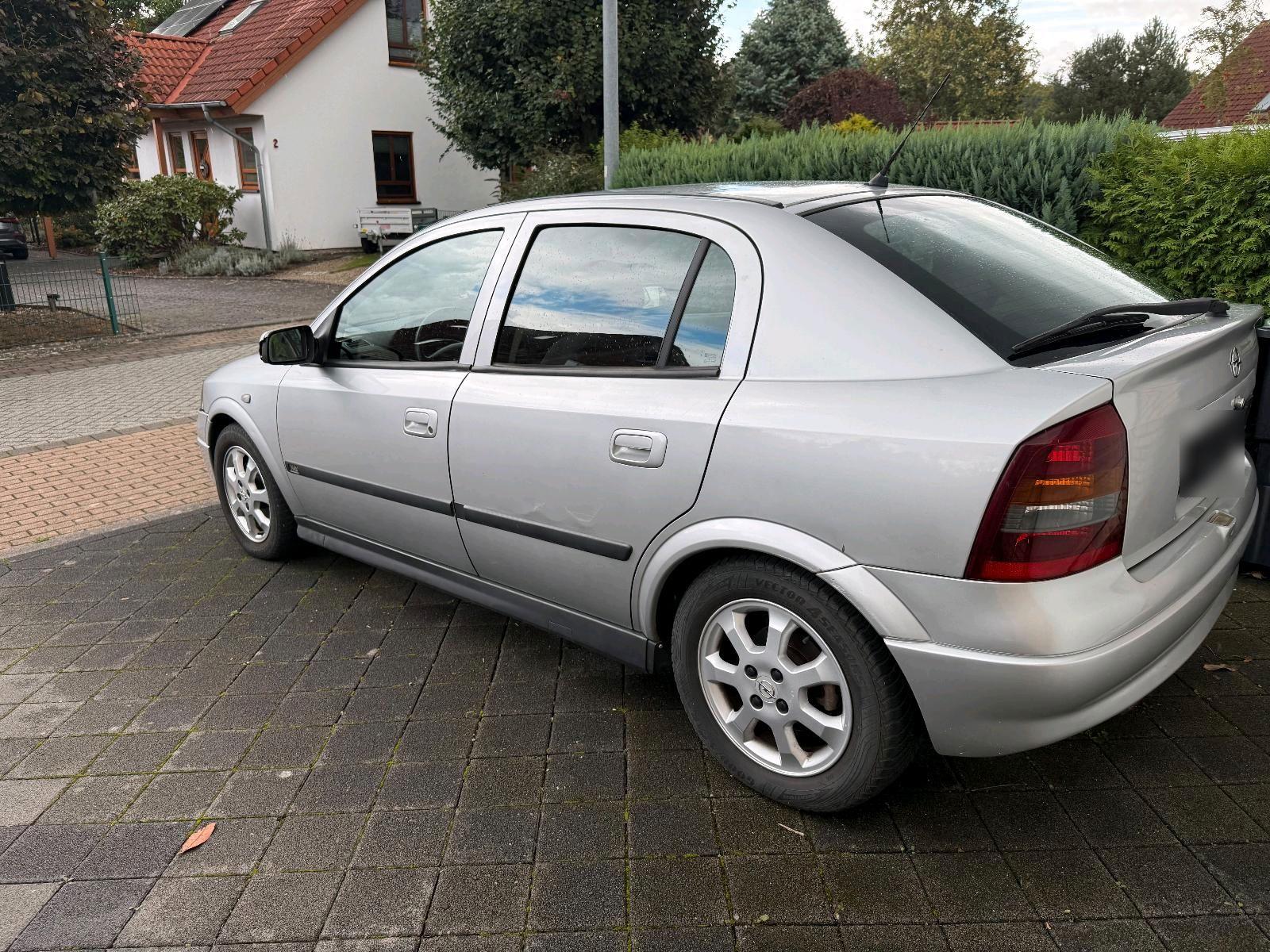 Opel Astra 2004 — engine 105 HP (77kW)