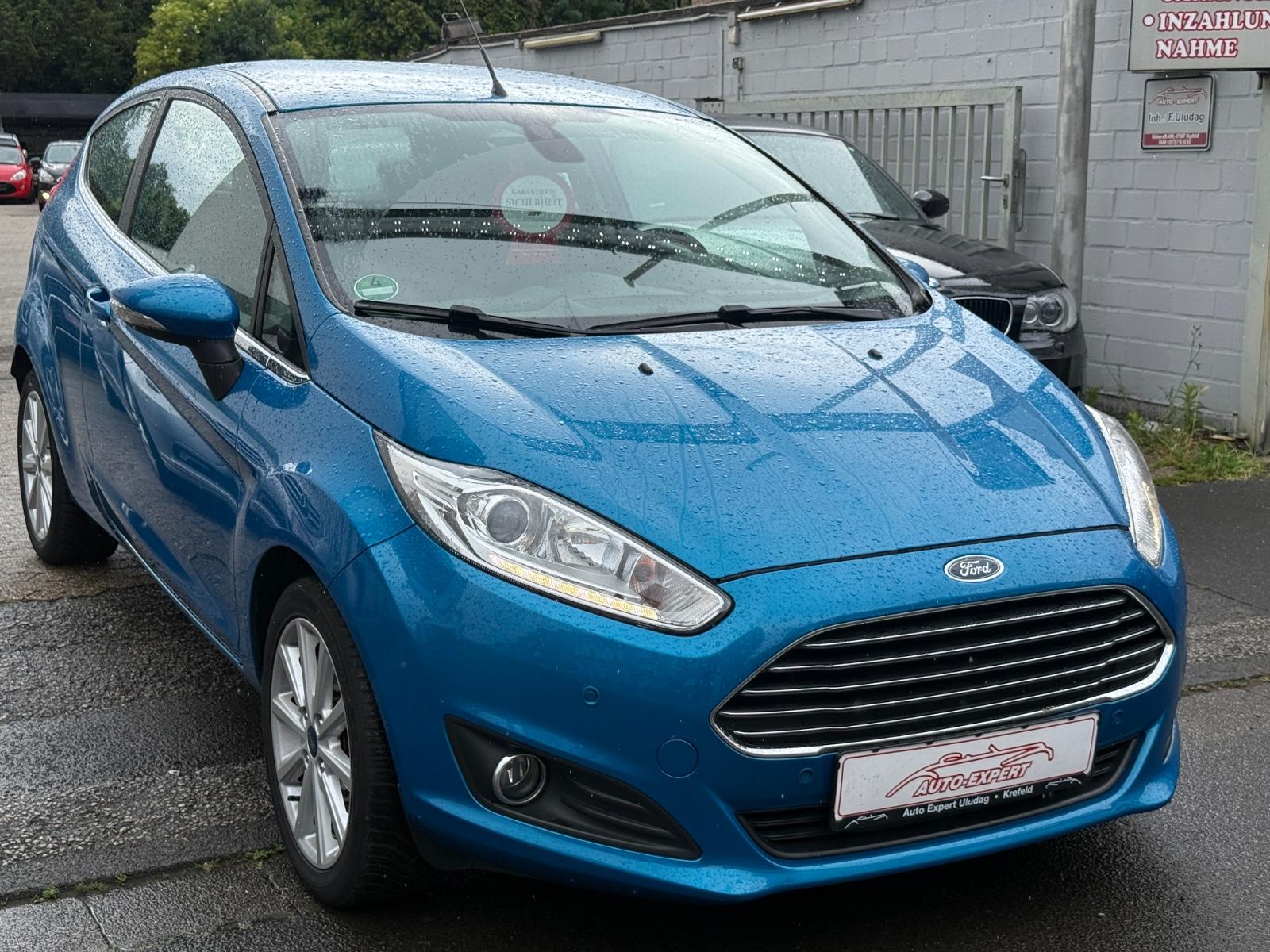 Ford Fiesta Titanium 1.25 AUS 1.HAND+SCHECKHEFT+PDC