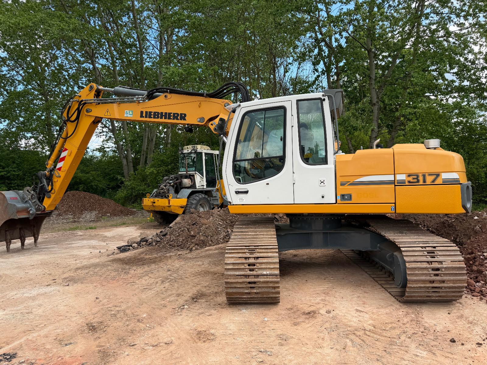 Liebherr R 317 Likufix SW 48 3x Löffel