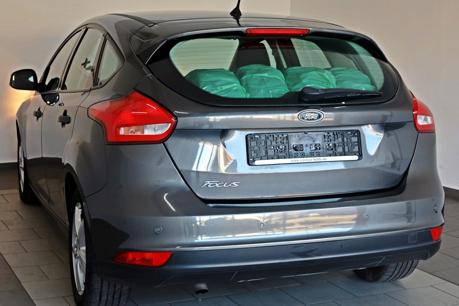 Fahrzeugabbildung Ford Focus Lim. Business,Tempomat,PDC,Navi,SH,SR+WR