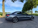 BMW 440i X Drive Cabrio Sportsline  - graue BMW 440