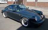 Porsche 911 Carrera 3,2 in Tannengrün metallic - Porsche aus 1989: 911 Carrera