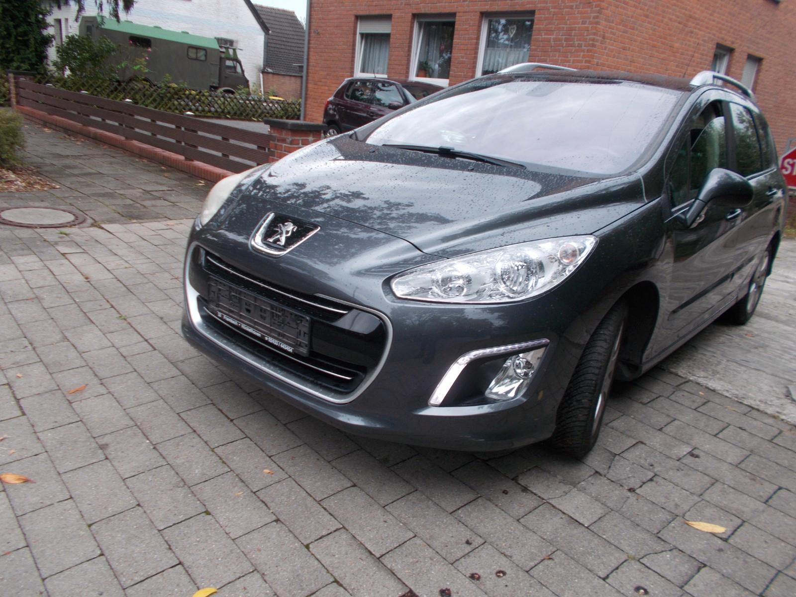 Peugeot 308 2012 — photo 16
