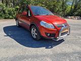 Suzuki SX4 1.9 DDiS 4WD Allrad - rote Suzuki SX4