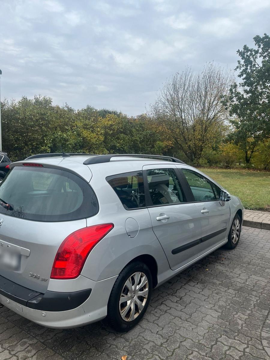 Peugeot 308 2011 — photo 14