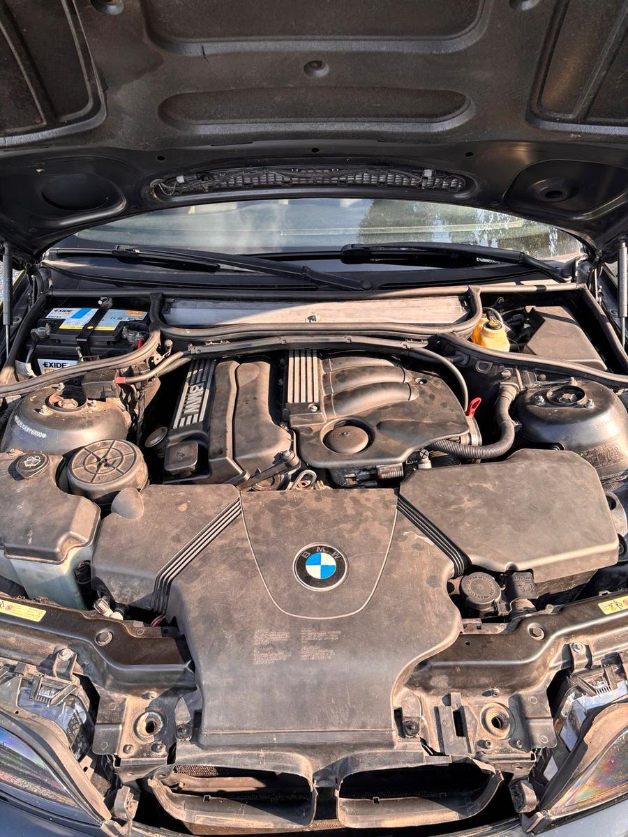 BMW 318 2004 — photo 12