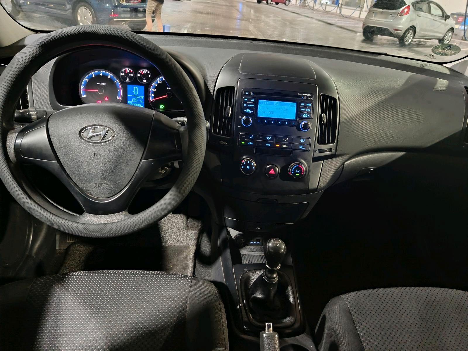 Hyundai i30 2009 — photo 14