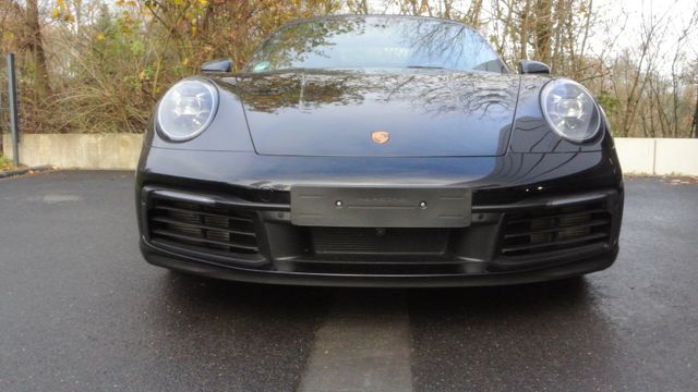 Porsche 992 cabrio,schw/schw,abgas,21",bose,matrix,kamer