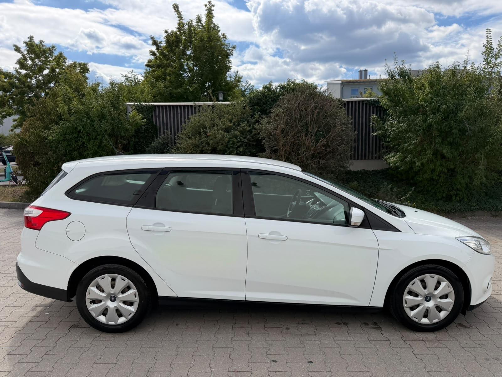 Ford Focus 2013 — engine 1.560 cm³, 95 HP (70kW)