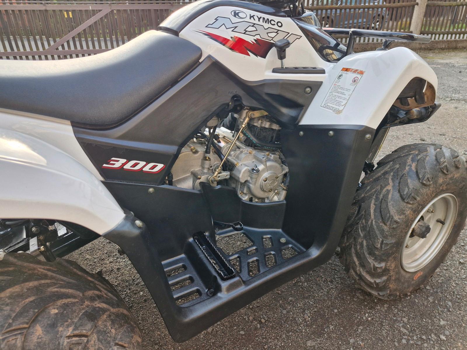 Kymco  2009 — двигун 300 cm³, 20 HP (15kW)