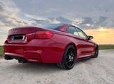 BMW F83 M4 in Imolarot in einzigartigem Zustand - BMW M4 in Nürnberg