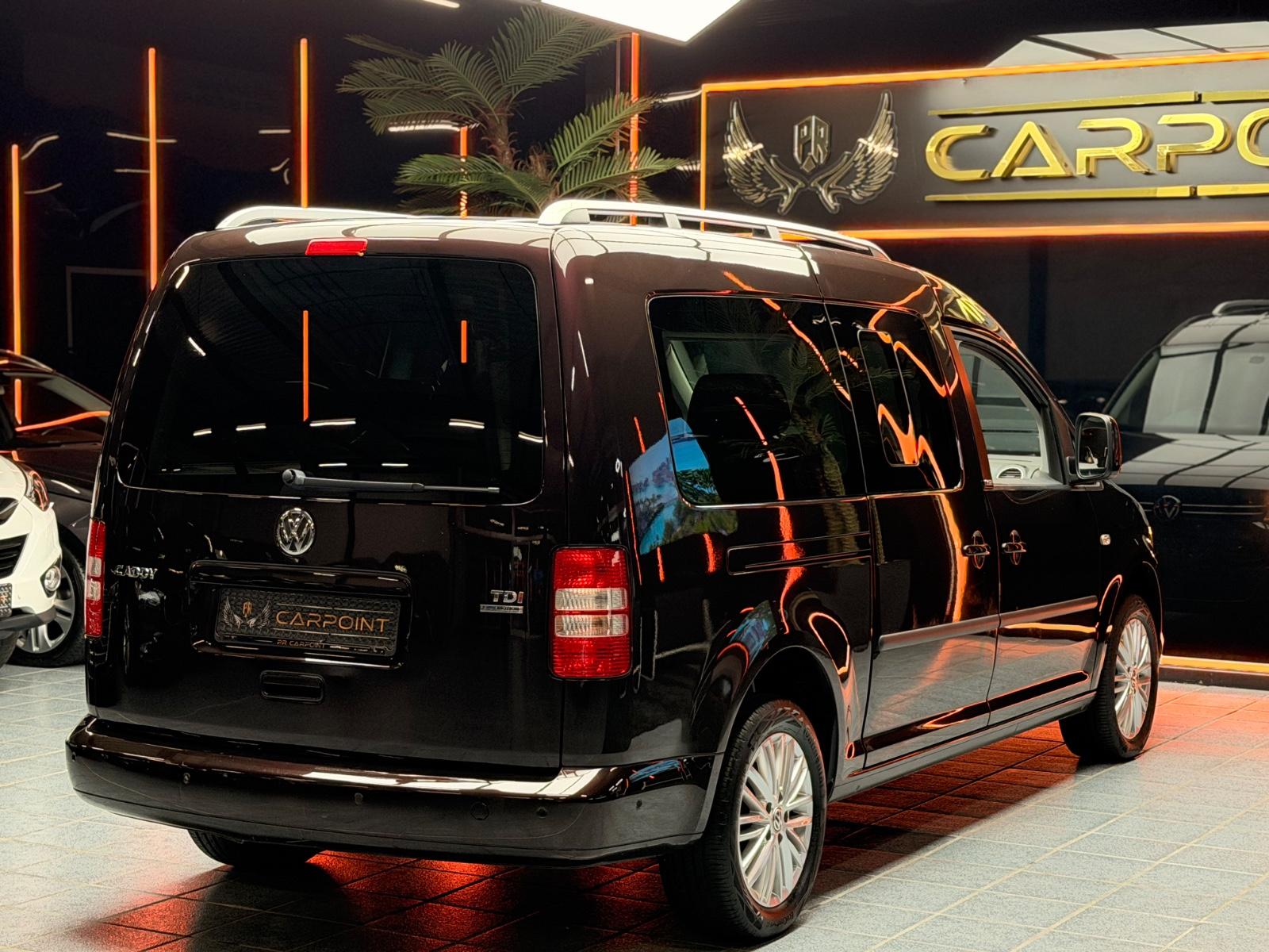 Volkswagen Caddy Maxi Kombi / Navi /7-Sitzer/Rollstuhl-Kran