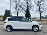 Volkswagen Touran 1.6 TDI 115 CV SCR DSG Highlin - Volkswagen Touran: Halbautomatik