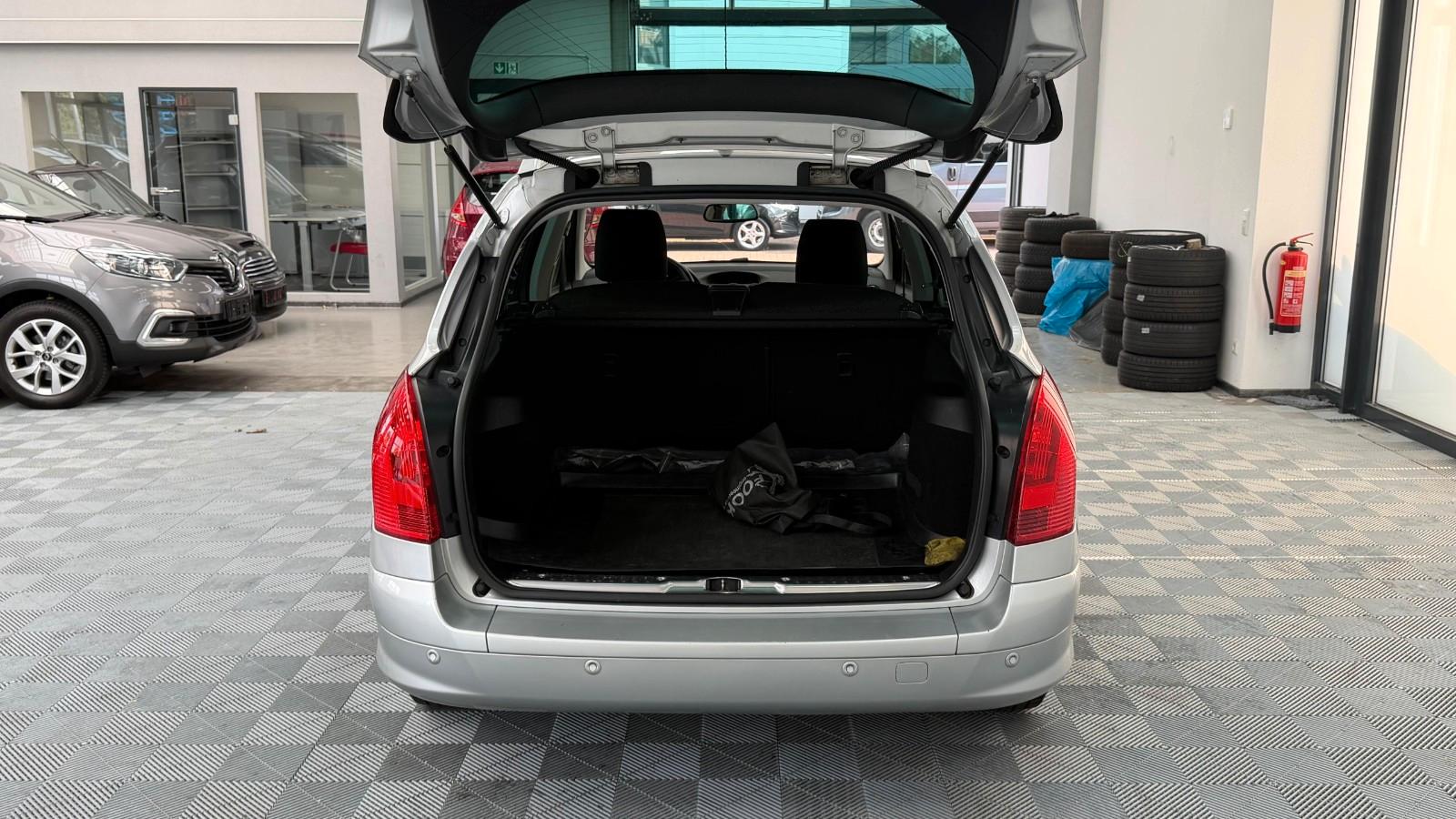 Peugeot 308 2011 — photo 11