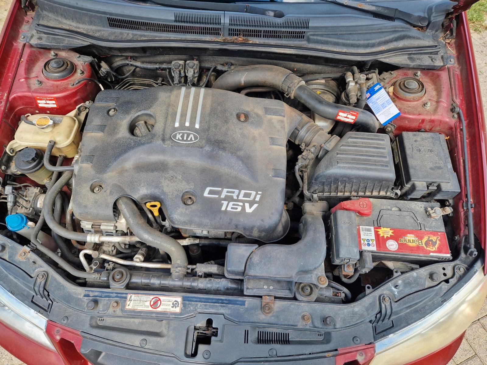 Kia Cerato 2005 — photo 16