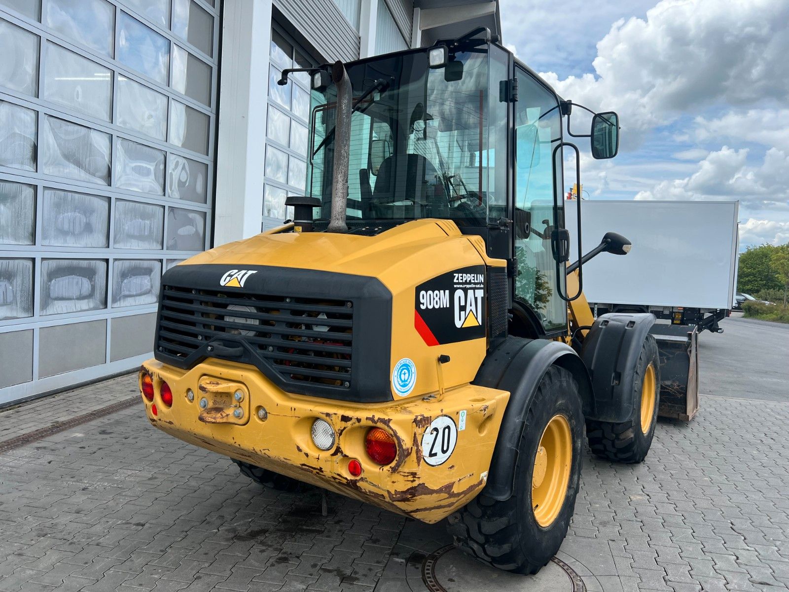 Fahrzeugabbildung CAT 908M / 3.000h / Gabel / Schaufel