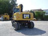 CAT M316 D mit OQ 70/55 - CAT Raupe/Dozer D5