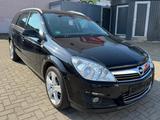 Opel Astra 1.6 *Teilleder/Klimaautomatik/85KW/PDC* - Opel Astra aus 2009: Kombi