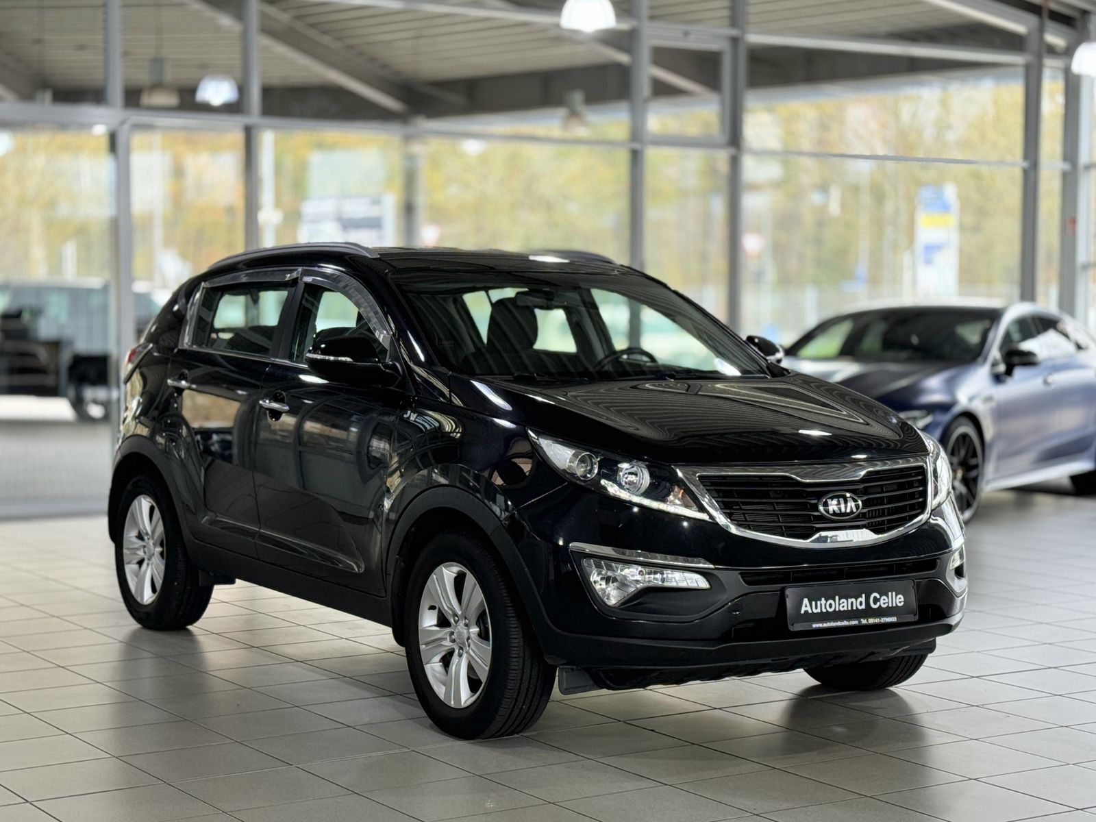 Fahrzeugabbildung Kia Sportage 1.7 CRDi 2WDKamera AHK PDC Sitzhzg Navi