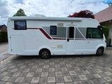 Roller Team Kronos 284 integral mit Hubbett und Einzelbetten - Wohnmobil oder -wagen mit Hubbett
