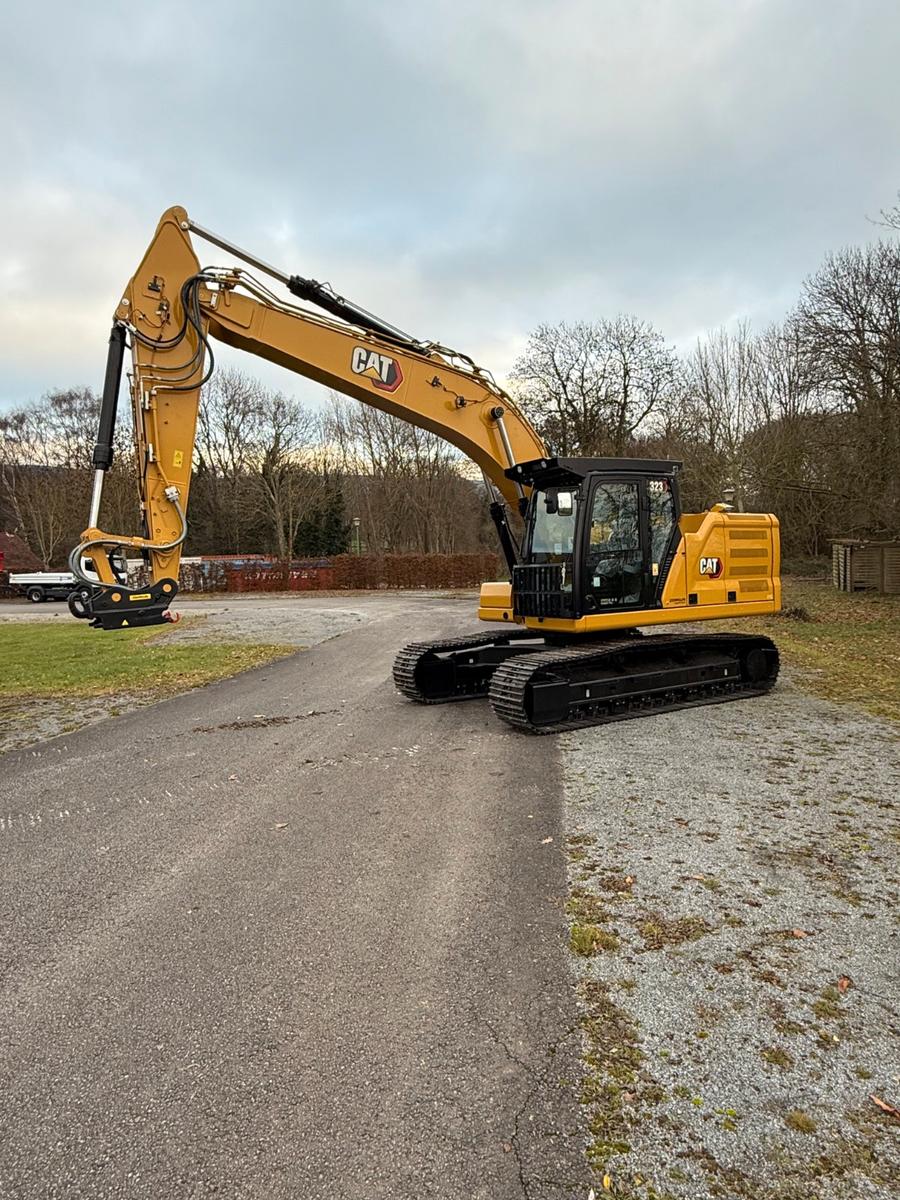 CAT 323 Kettenbagger  OQ70/55
