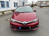 Toyota Auris Hybrid Edition-S+, 8-fach, Scheck - rote Toyota Auris