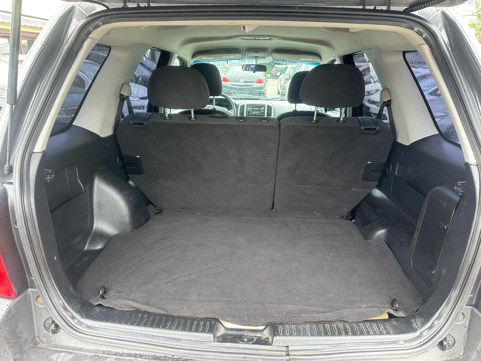 Ford Maverick 2005 — photo 11