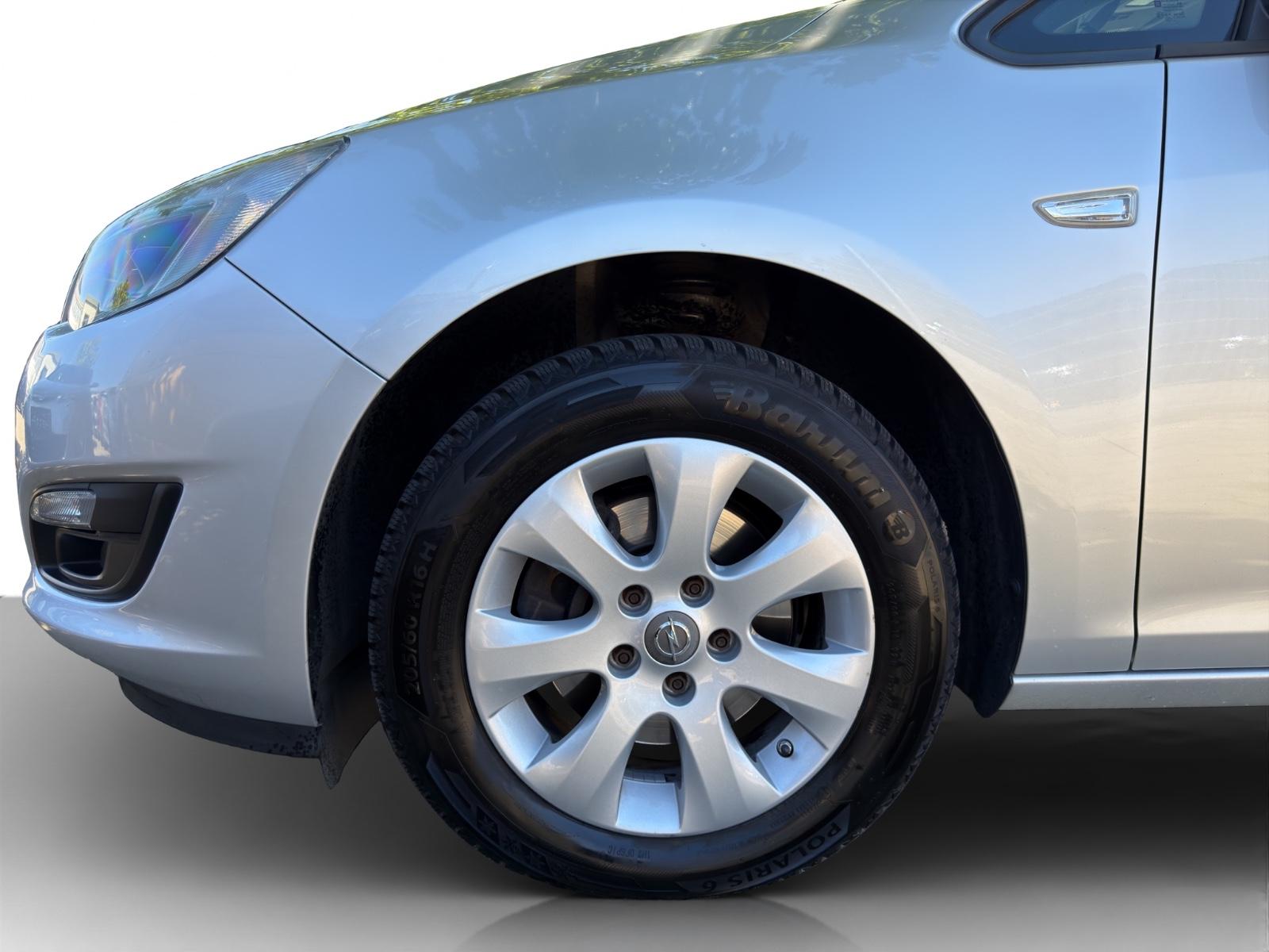 Opel Astra 2014 — photo 18