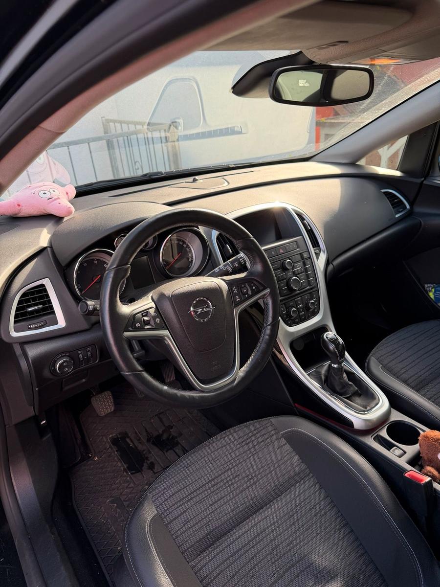 Opel Astra 2015 — фото 7