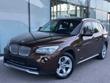 BMW X1 23 d xDrive Aut./Bi-Xenon/Pano/Navi/PDC/1.H. - gebrauchte BMW X1 aus dem Jahr 2009