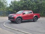 Isuzu D-Max V-Cross im Vorlauf 25er Modell - rote Isuzu D-Max